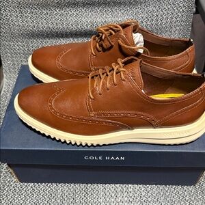 Cole Haan Grand Shoes. Brown in color. Size 10.5. NIB.